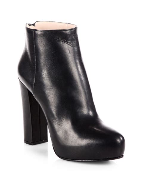 prada platform ankle boots.